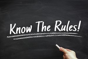 Graphic with chalkboard and text "Know the rules!"