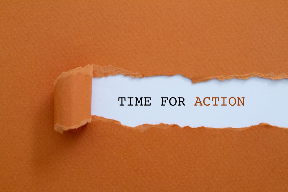 TIME FOR ACTION written under torn paper.