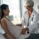Pregnant Woman with Doctor