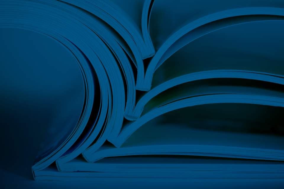 Image of open books with dark blue overlay