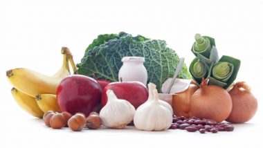 Prebiotic foods including cabbage, leek, apples, nuts and pulses, healthy for the gut and immunity