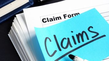 Stack of Claims applications on a desk. Stack of Claims applications on a desk.
