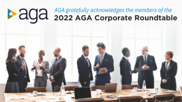 Image of businesspeople talking with text "AGA gratefully acknowledges the members of the 2022 Corporate Roundtable"