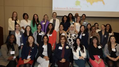 A group photo of women sitting and standing who attended the Southwest regional workshop.