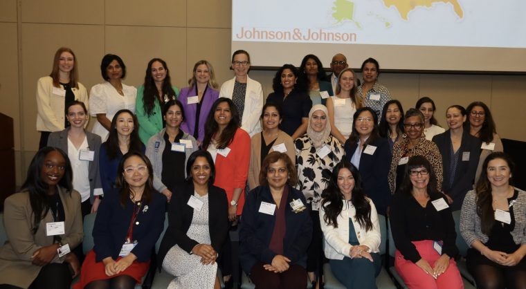 A group photo of women sitting and standing who attended the Southwest regional workshop.