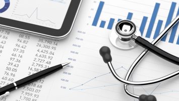 Stethoscope with financial statement digital tablet Medical Billing