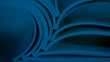 Image of open books with dark blue overlay